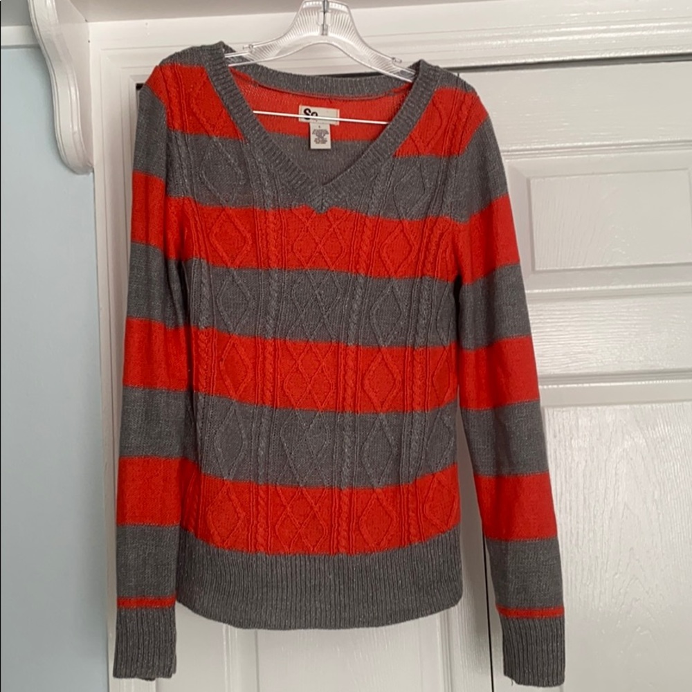 Red and gray striped sweater